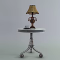 Stylish Side Table With Round Top Metal Base Decorative Lamp And Small Cup 3d model