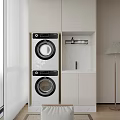 Stacked Washing Machines in Modern Laundry Space with White Cabinets Marble Countertop and Sink