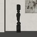 Abstract Dark Wooden Sculpture with Stacked Organic Geometric Shapes in Modern Space