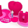 Vibrant Pink Crush Display With Heart Shape I U Plush Decorations And Person
