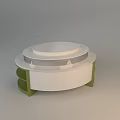 Circular Multi Tiered Display Shelf With White Surface And Green Supports For Product