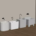 White Bathroom Accessories With Four Units Featuring Faucets Against Wall On Wooden Floor