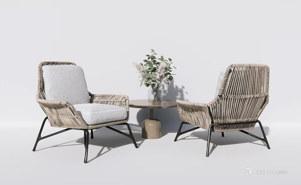 Modern Rattan Table and Chairs Set Featuring Gray Cushions Black Metal Legs and Vase Flowers 3d model 