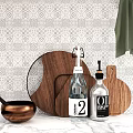 Elegant Kitchen Utensils On Marble Countertop With Wooden Cutting Board And Copper Pot