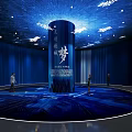 Blue Exhibition Hall with Central Cylindrical Pillar Characters People Walking and Ceiling Lighting Decorations