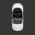White Luxury Convertible Sports Car With Red Rims And Glossy Exterior