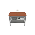 Kitchen Prep Table With Wooden Top And Metal Frame Drawers Shelves Wine Glasses And Plates