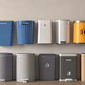Various Colored Trash Bins With Different Designs And Lids Neatly Arranged