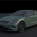 Sleek Light Green Electric Sedan With Smooth Lines And Black Wheels Modern Design