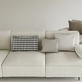 Modern Light Beige Three Seater Sofa With Houndstooth Gray And Cream Pillows Interior