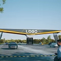 Modern Entrance Gate With LOGO Sign Awning Structure Cars Green Trees And Blue Sky