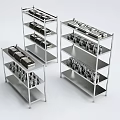 Three Stainless Steel Shelves Displaying Organized Kitchenware And Cooking Tools