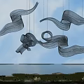 Abstract Pendant Lights with Blue and Gray Flowing Ribbon Design Over Garden Water View