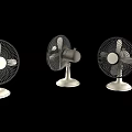 Three Tabletop Air Conditioner Fans with Black Blades and White Base on Black Background