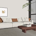 Light Beige Three-Seater Sofa with Cushions and Brown Coffee Table in Bright Modern Living Room