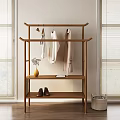 Wooden Multi Tiered Clothes Rack With Hanging Clothes Vase Shoes And Window Blinds