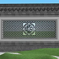 Traditional Chinese Garden Wall With Carved Lattice Calligraphy Greenery Rocks And High Rise Buildings