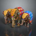 Three Colorful Decorative Elephant Figurines With Vibrant Patterns And Ornate Details
