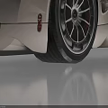Silver Supercar with Streamlined Body Aerodynamic Design Large Wheels and Rear Spoiler