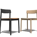 Two Modern Dining Chairs In Black And Light Wood With Simple Backrest Design