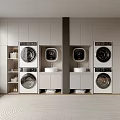Modern Laundry Room With Stacked Washing Machines Dryers Sink And White Storage Cabinets