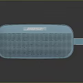 Bose Light Blue Portable Bluetooth Speaker With Hand Strap And Compact Design