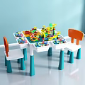Kids Play Table with Building Blocks and Orange Back Chairs Blue Legs