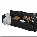 Modern Black Leather Two Seater Sofa With Decorative Pillows Blanket And Book