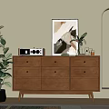 Modern Wooden Entryway Side Cabinet With Drawers Green Plant And Decorative Artwork