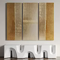 Modern Abstract Paintings in Brown Beige Tones Hanging on Wall with White Decorative Shelf