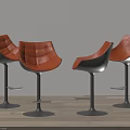 Modern Bar Stools With Orange Leather Upholstered Seats And Sturdy Black Base