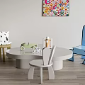 Colorful Kids Table and Chair Set With Round Table Star Pattern Cushion and Blue Chair