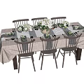 Stylish Dining Table Set with Black Chairs Light Tablecloth and Green Plant Decorations