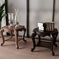 Two Classic Wooden Side Tables With Carved Legs Green Plant Glass Vases And Books
