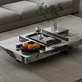 Modern Marble Coffee Table with Oranges Books Vase and Plants on Living Room Rug