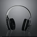 Modern Over Ear Headphones With Sleek Silver Headband And Black Cushions