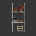 Three Tiered Metal Kitchen Shelf With Pots Dishes And Storage Baskets