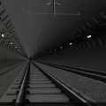 Long Curved Concrete Subway Tunnel With Neat Railway Tracks And Distant Approaching Train Lights