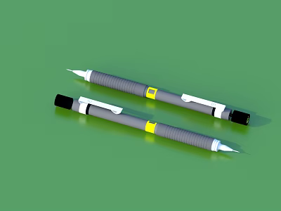 Two Gray Textured Grip Ballpoint Pens With Yellow Accent On Green Background 3d model