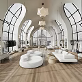 Bright Modern High End Clothing Store With Arched Windows Wood Flooring And Cozy Lounge Area