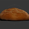 Fresh Baked Bread With Golden Lattice Pattern And Shiny Crust On Black Surface