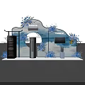 Modern Exhibition Booth Design With Cloud Shaped Backdrop Blue Flowers And Display Devices 3d model