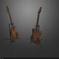 Two Brown Acoustic Guitars Placed on Black Stands Against Gray Background