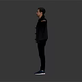 Man With Arms Outstretched In Black Jacket Blue Shirt Black Pants Blue Shoes Gray Background