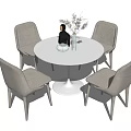Round White Dining Table With Four Light Gray Chairs And Decorative Vase 3d model