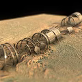 Sandy Terrain Featuring Metal Tunnels And Damaged Circular Structures