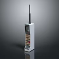 Vintage Mobile Phone With White Body Long Antenna Numeric Keypad And Bulky Retro Design