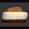 Delicious White Dessert With Red Drizzle And Orange Crunchy Topping