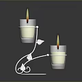 Silver Metal Candle Holders With Curved Stand Grapevine Decoration And Lit Candles