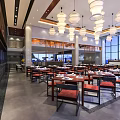 Modern Restaurant Interior With Elegant Chandeliers Wooden Tables And Red Chairs